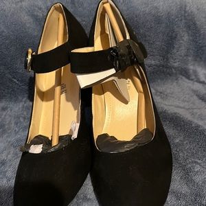 Mary Jane Black 2.5 inch heels, never been worn. Still in original package.